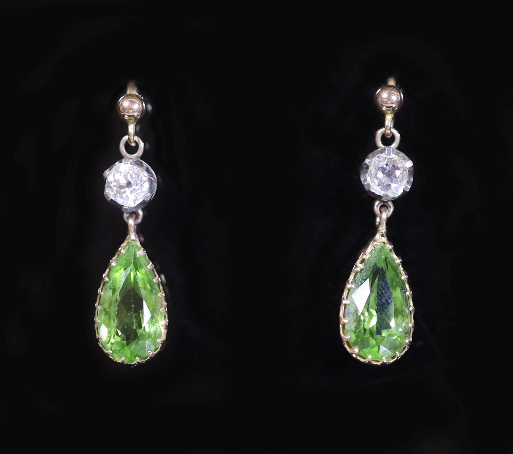 A pair of early 20th century gold, peridot and diamond set drop earrings